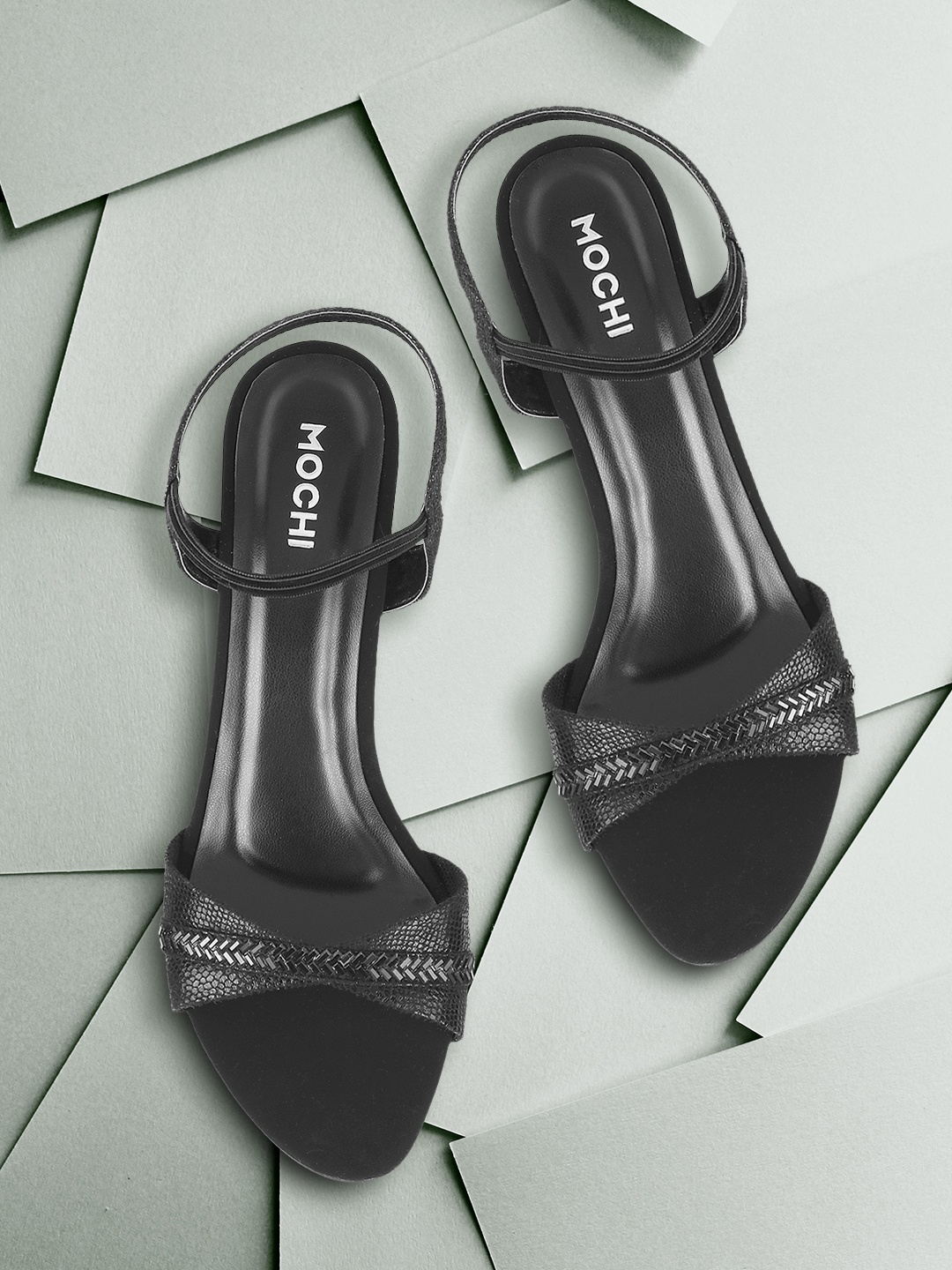 

Mochi Women Black Solid Heels