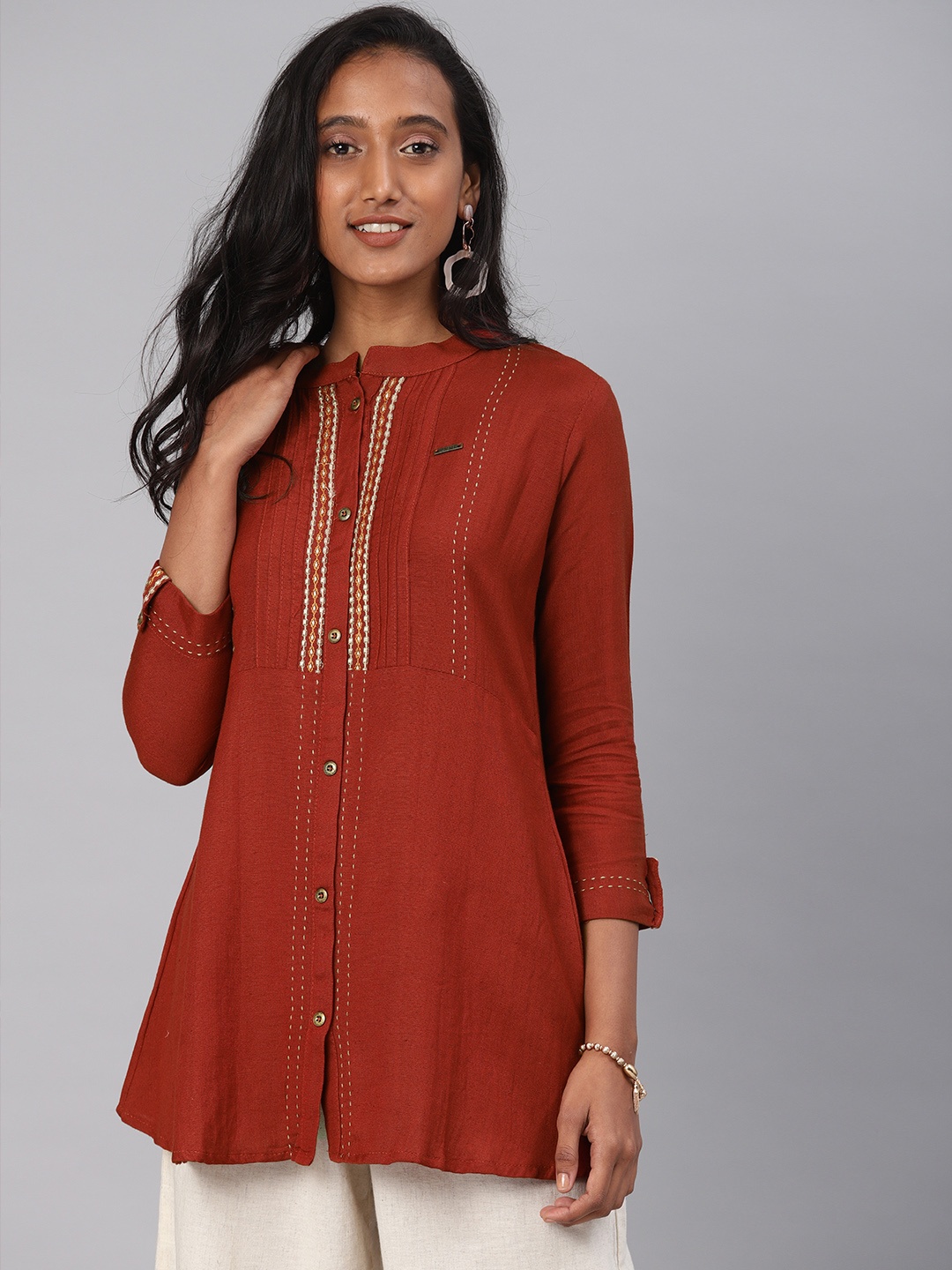 

Kvsfab Women Maroon Embroidered Straight Kurti