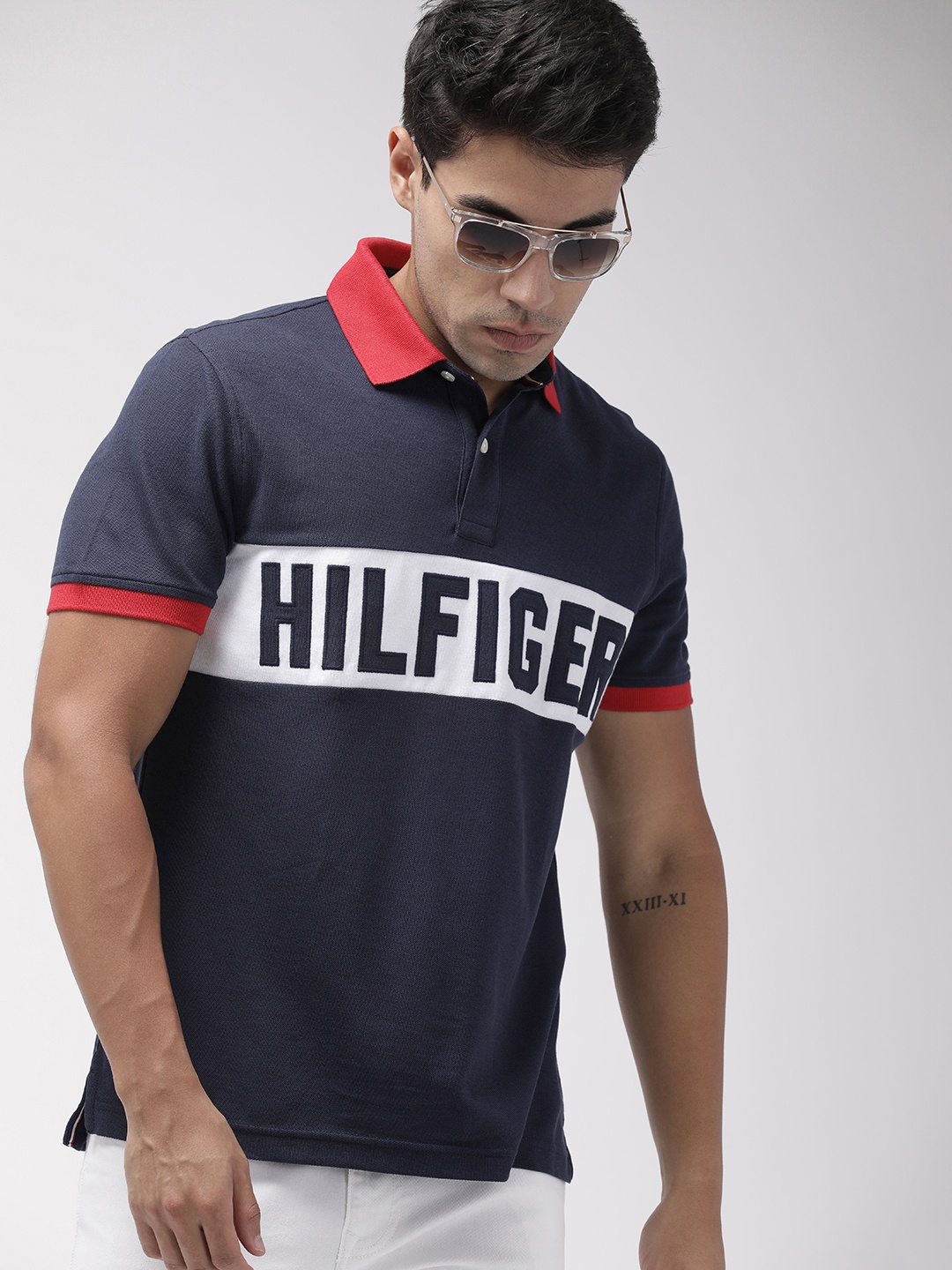 

Tommy Hilfiger Men Navy Blue & White Colourblocked Regular Fit Polo Collar T-shirt