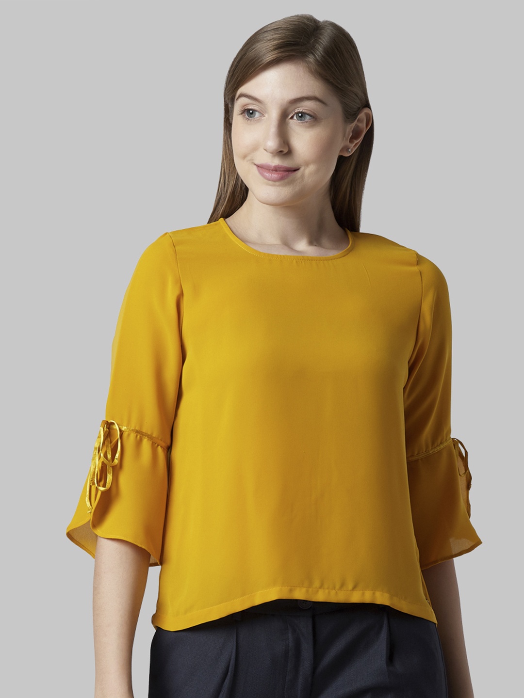 

Park Avenue Women Yellow Solid Top