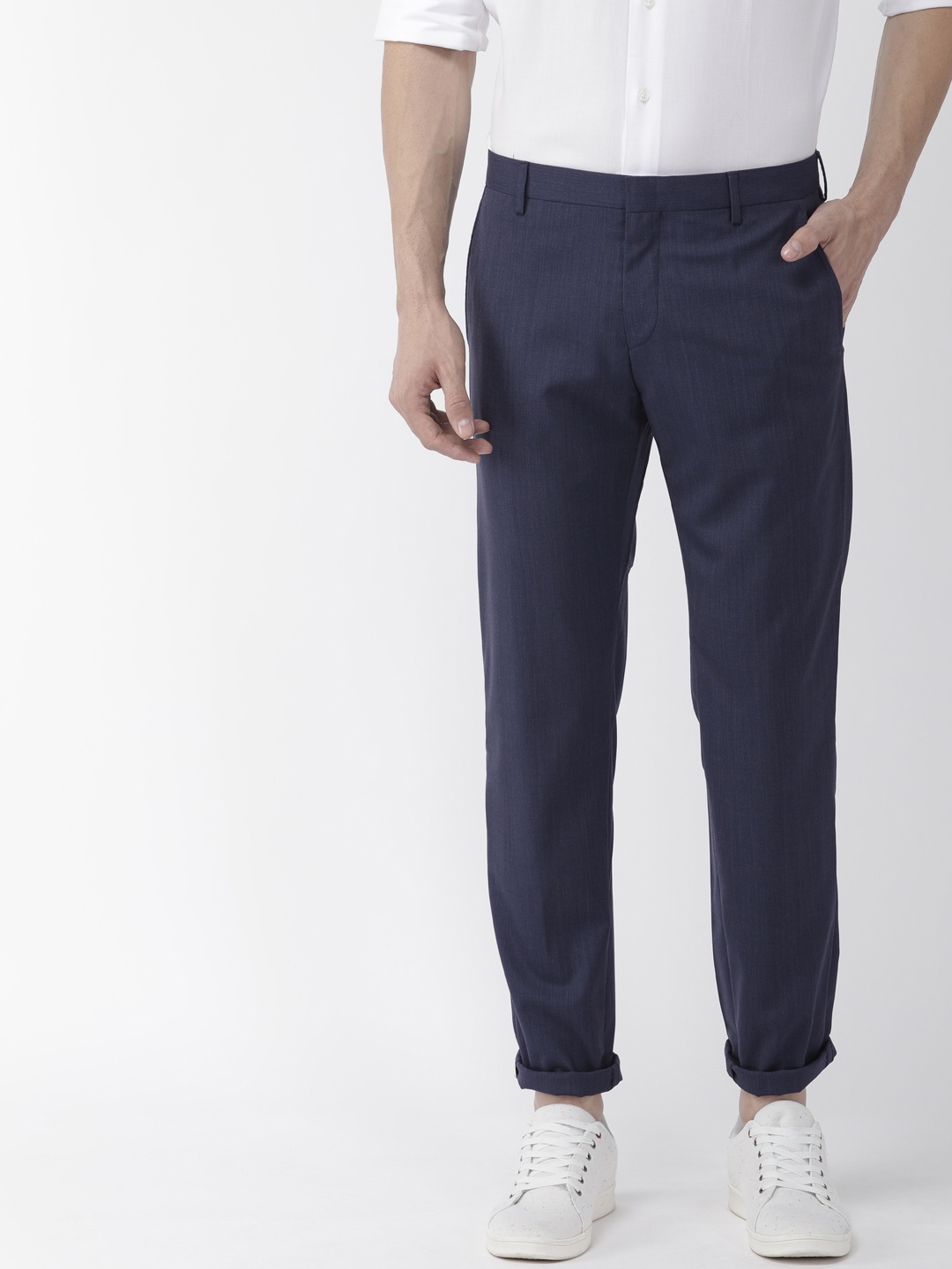 

Tommy Hilfiger Men Navy Blue Slim Fit Solid Regular Trousers