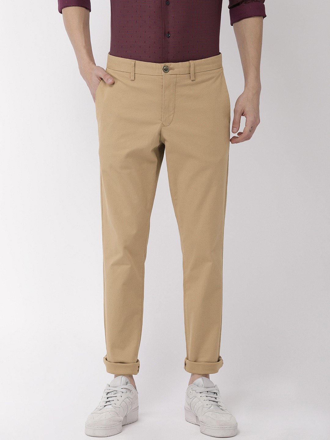 

Tommy Hilfiger Men Khaki Bleecker Slim Fit Self Design Regular Trousers