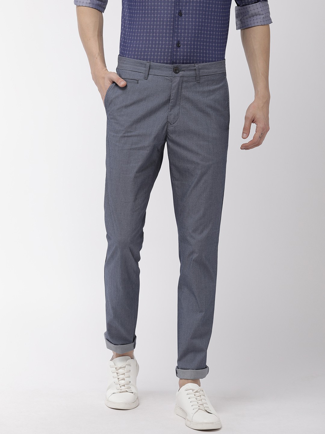 

Tommy Hilfiger Men Blue Slim Fit Solid Regular Trousers