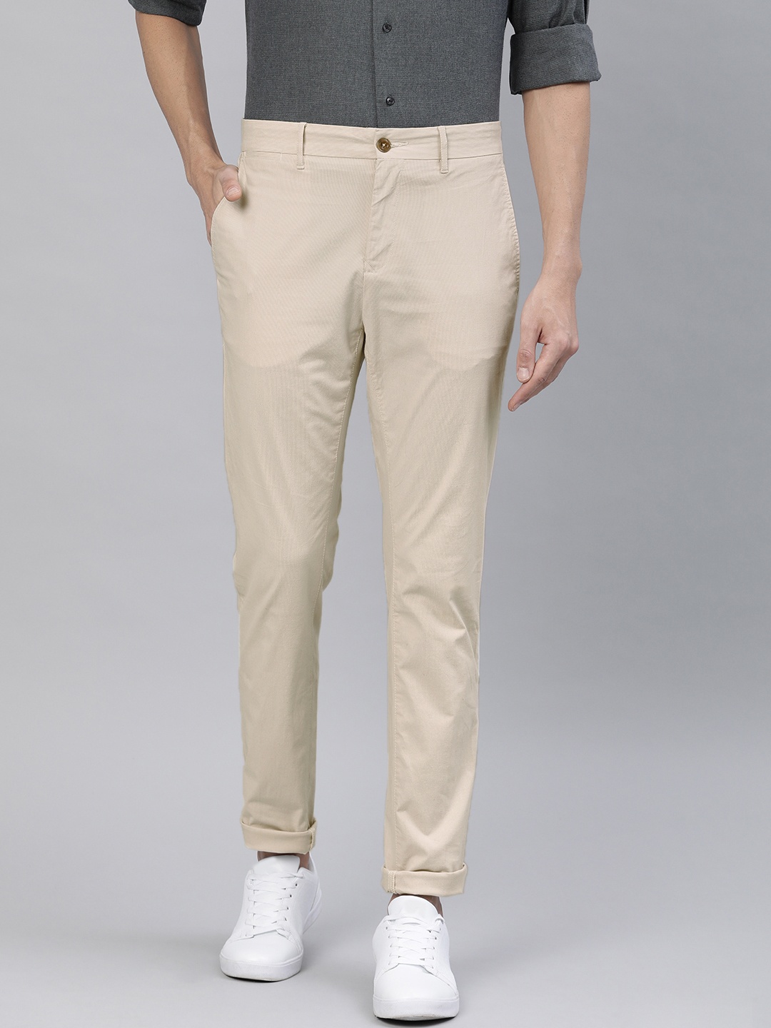 

Tommy Hilfiger Men Beige Straight Fit Solid Chinos