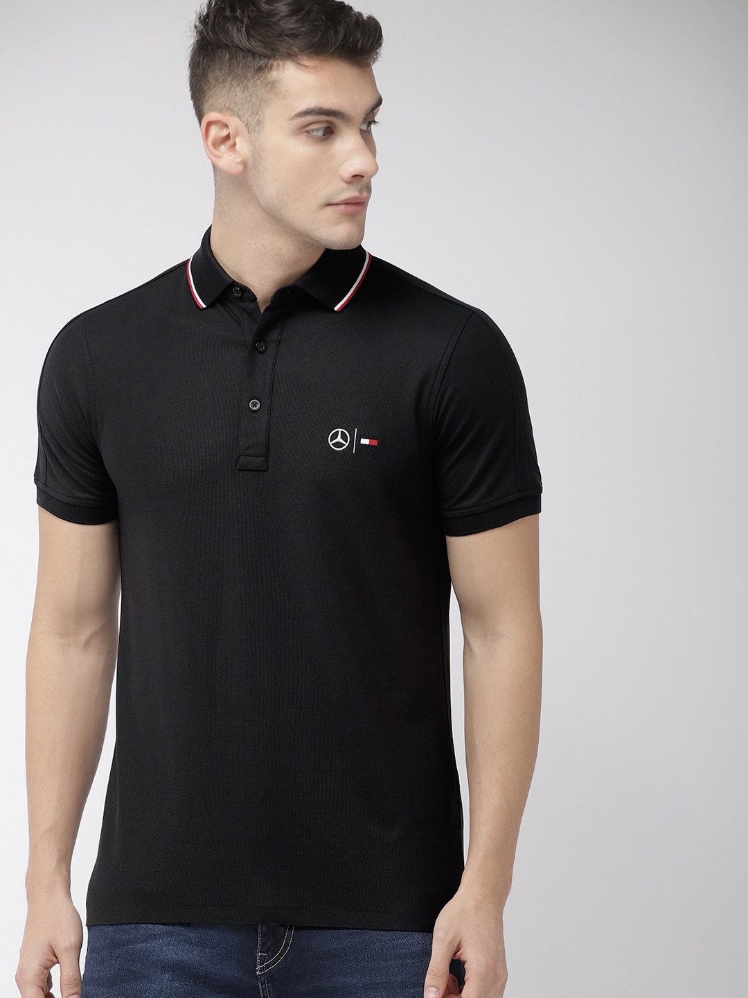 

Tommy Hilfiger Men Black Solid Polo Collar Pure Cotton T-shirt