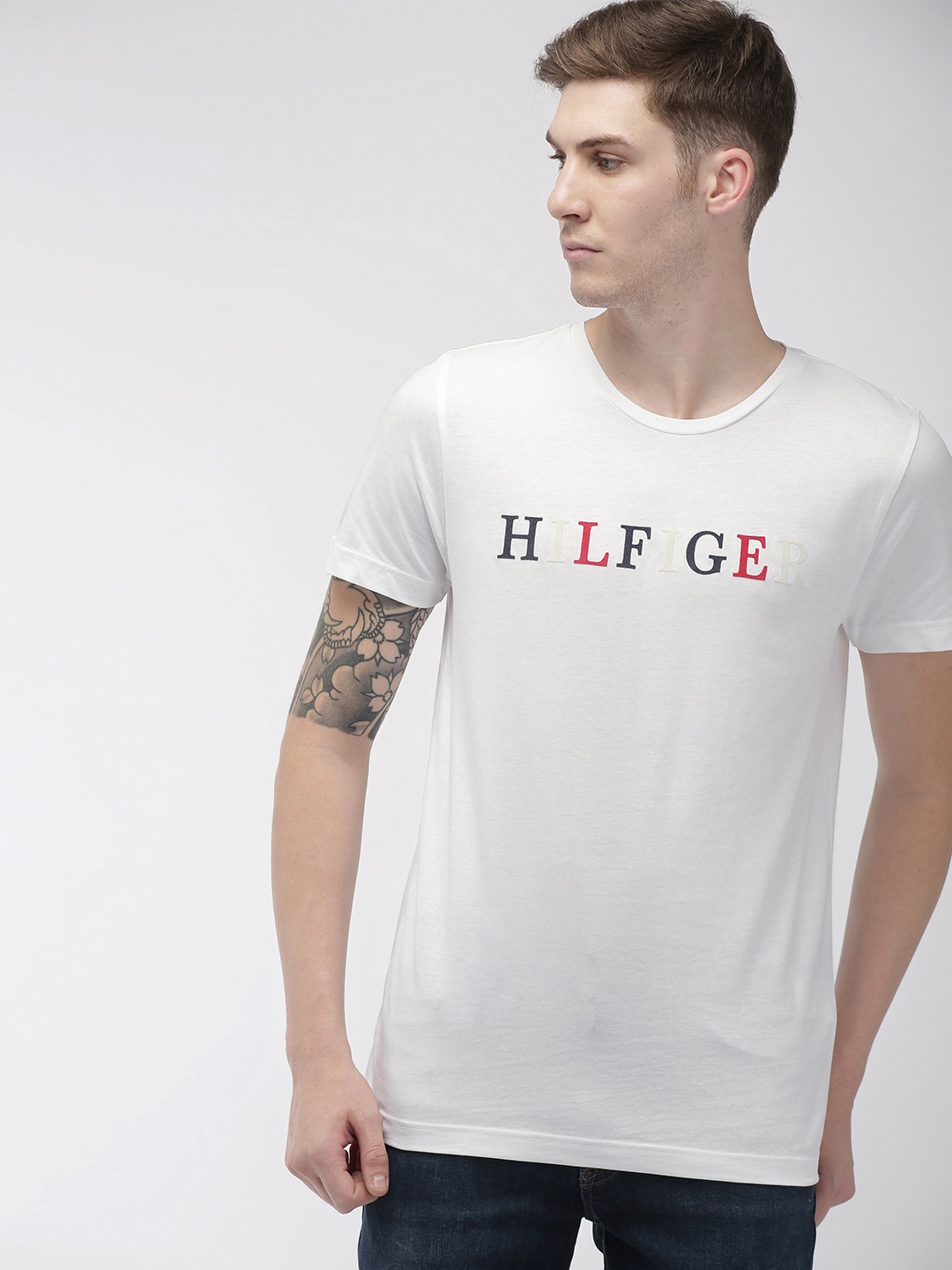 

Tommy Hilfiger Men White Printed Round Neck Pure Cotton T-shirt
