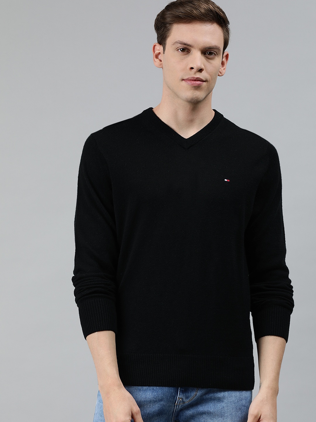 

Tommy Hilfiger Men Black Solid Pullover Sweater