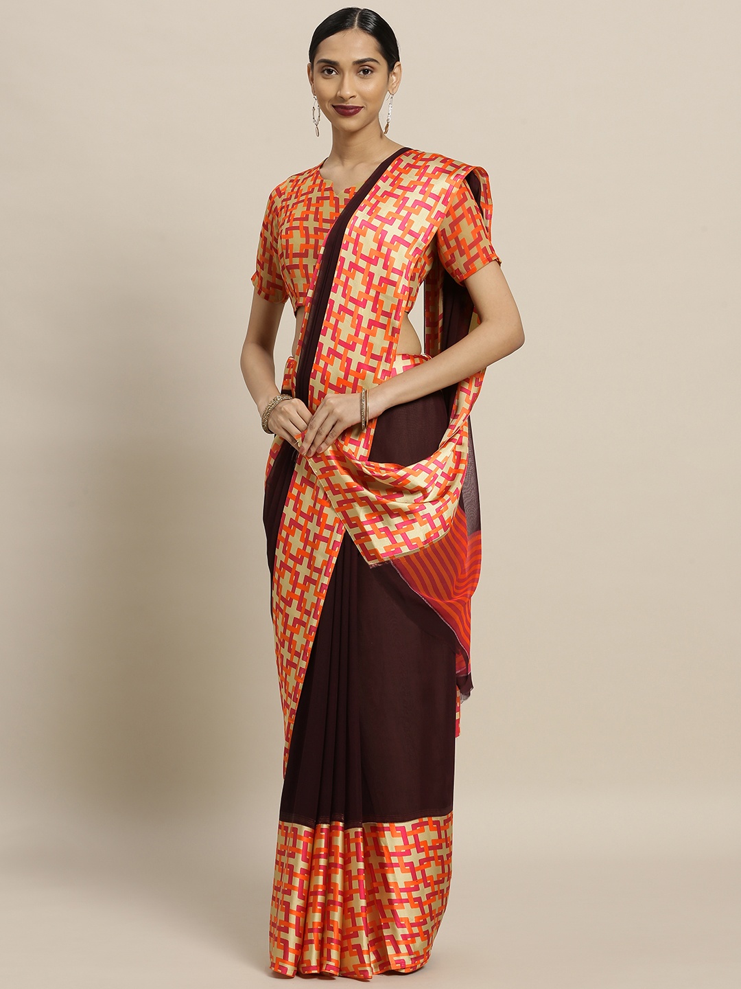 

Shaily Brown & Orange Satin Solid Saree