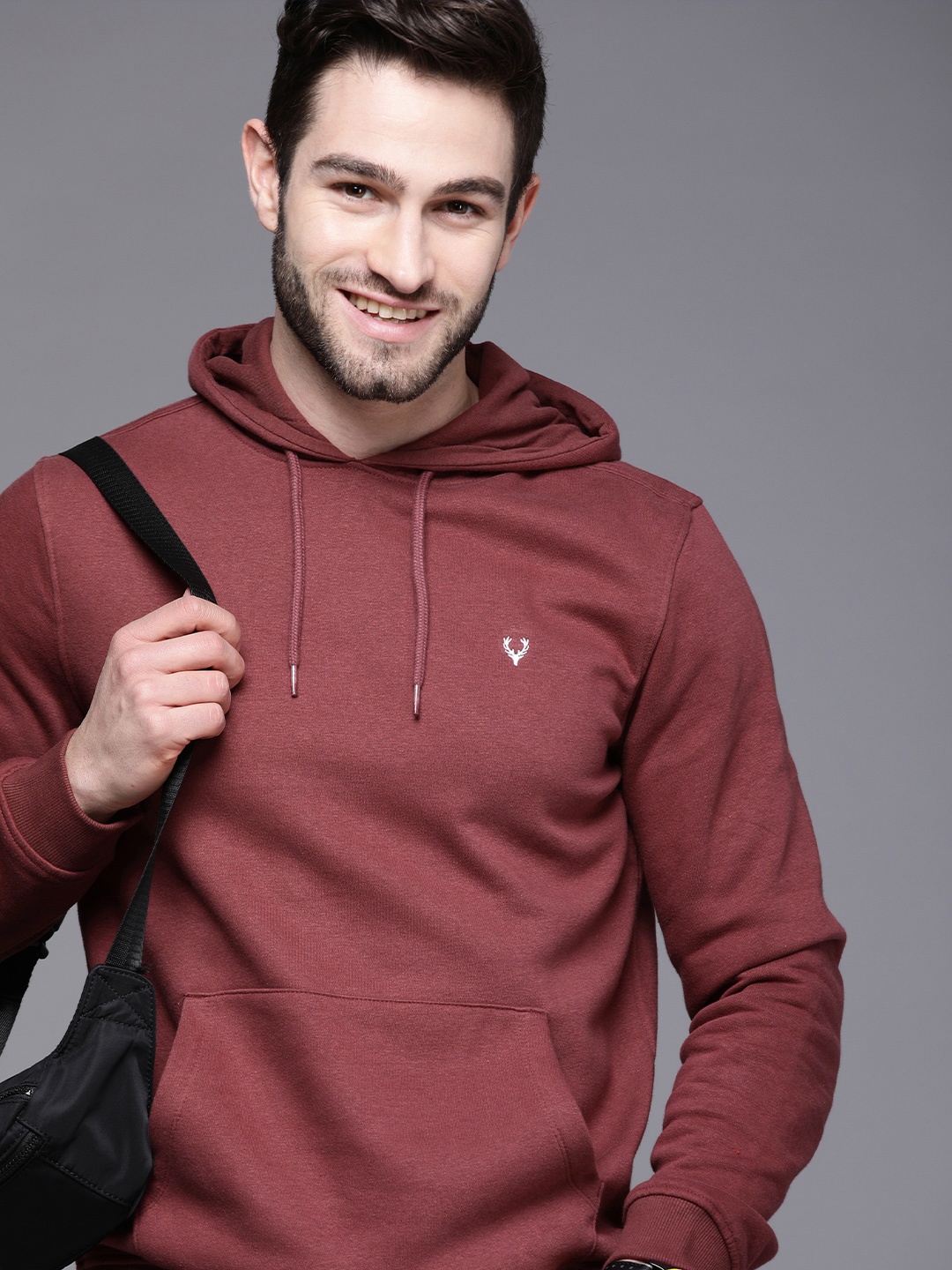 

Allen Solly Men Maroon Solid Hooded Sweatshirt