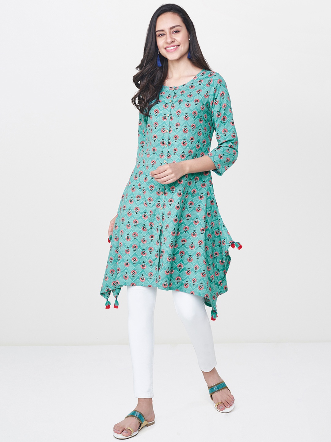 

Global Desi Women Turquoise Blue Printed Asymmetric A-Line Kurta