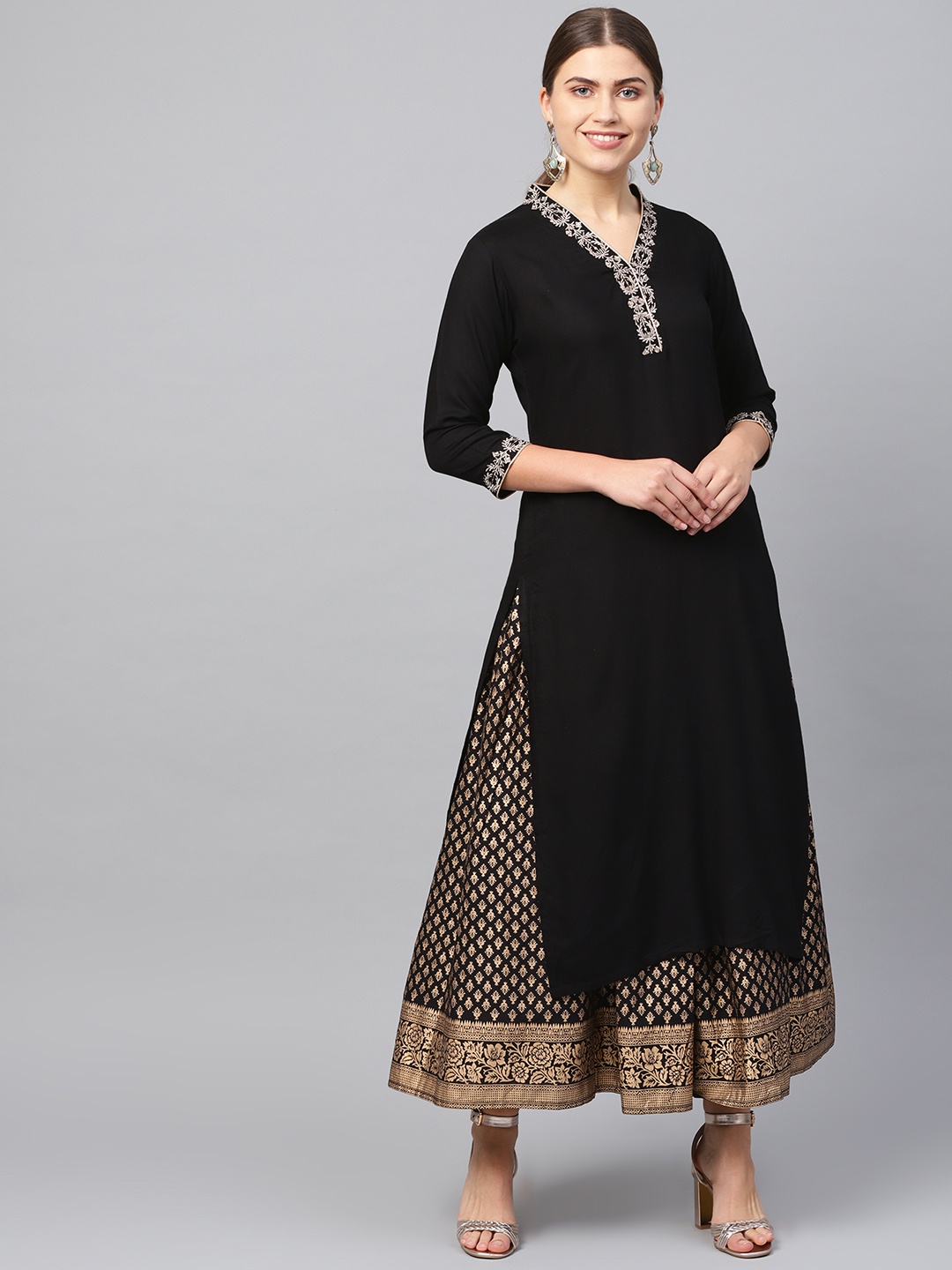

Varanga Women Black & Golden Printed Kurta with Skirt