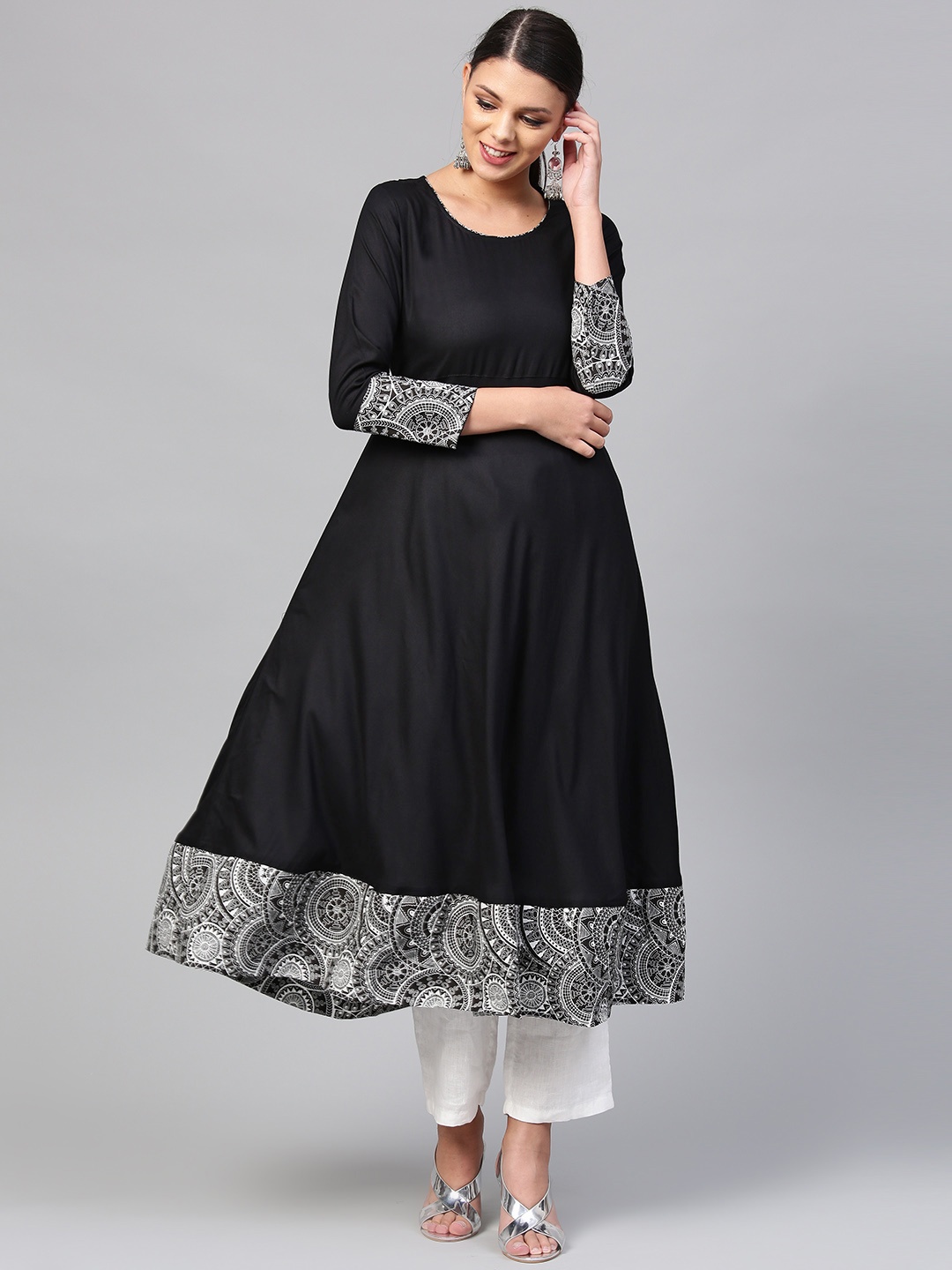 

Divena Women Black Solid A-Line Kurta