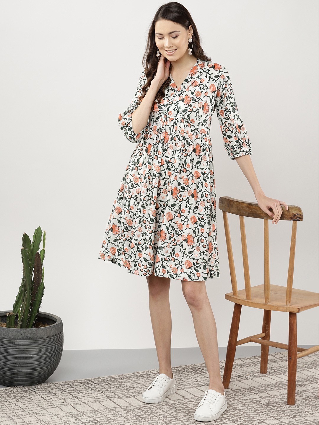 

Sangria Women Off-White & Green Printed Wrap Dress