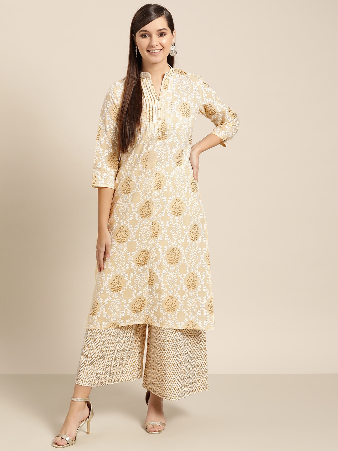 

Sangria Women Beige & Off-White Printed Kurta with Palazzos
