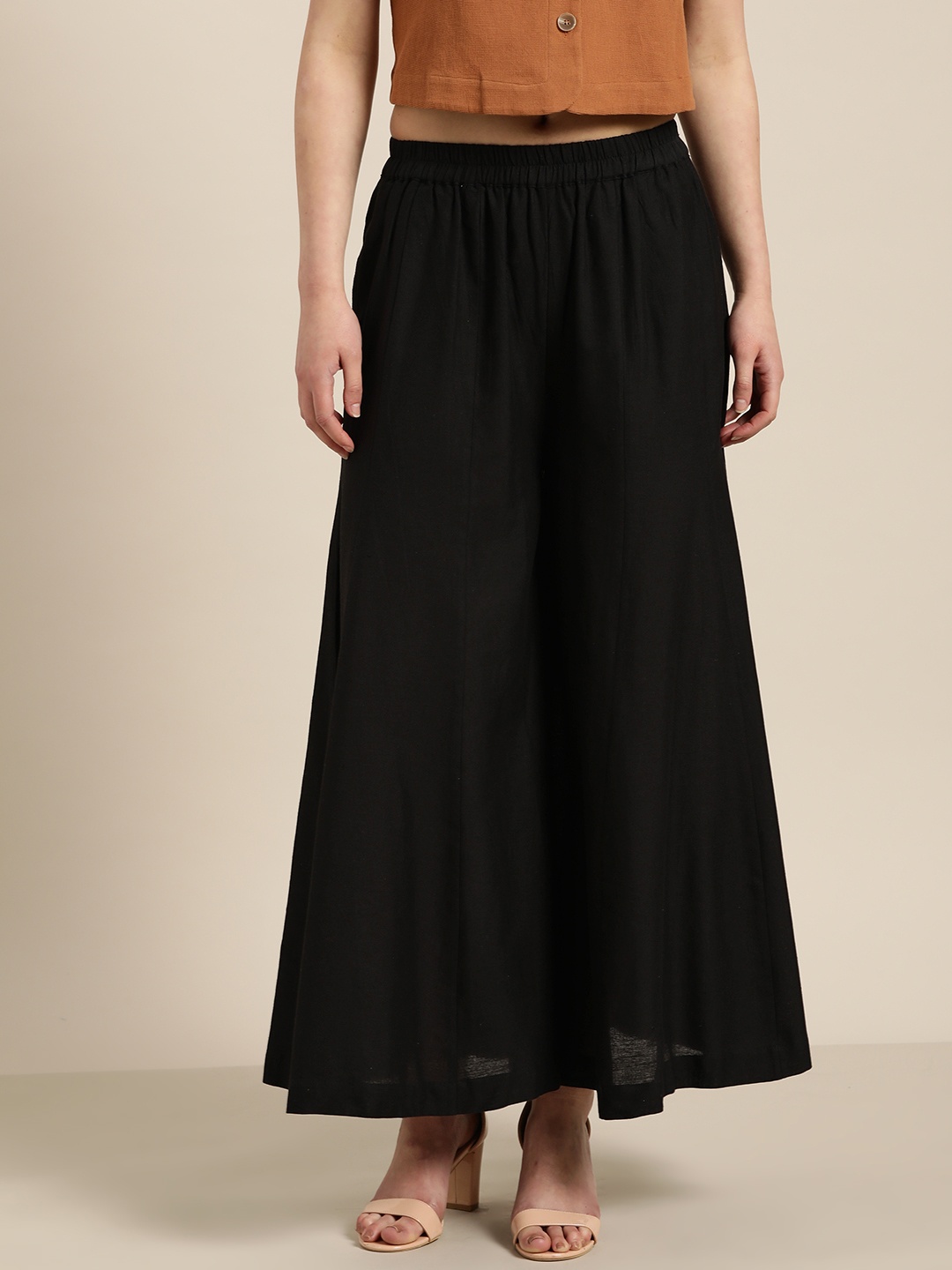 

Sangria Women Black Solid Flared Palazzos