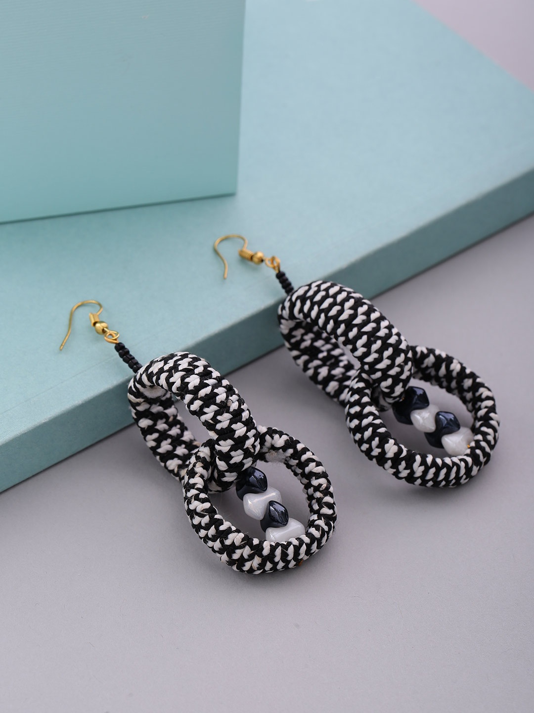 

PRITA BY PRIYAASI Black & White Handcrafted Circular Drop Earrings