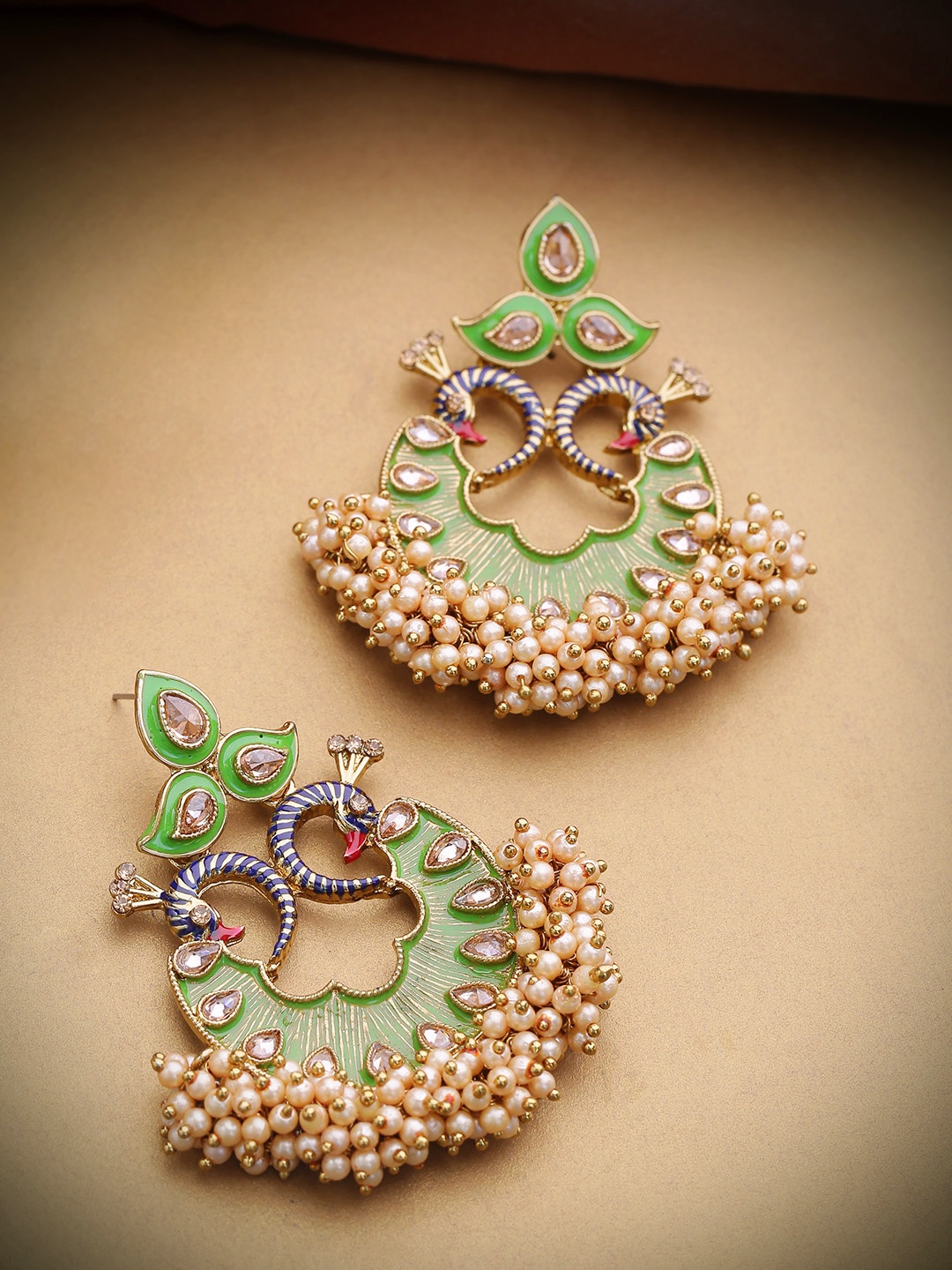 

Priyaasi Green Gold Plated Kundan Studded Handcrafted Peacock Shaped Chandbalis