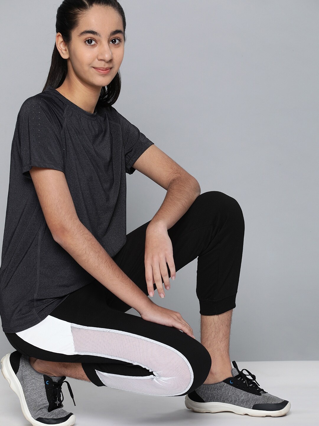 

HRX by Hrithik Roshan Girls Black Lifestyle Colourblocked Cropped Joggers