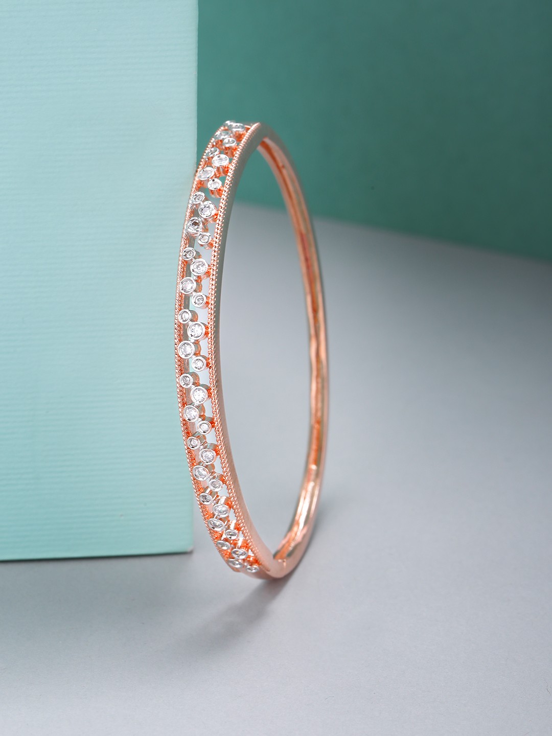 

Priyaasi Rose Gold-Plated AD-Studded Handcrafted Bangle Style Bracelet