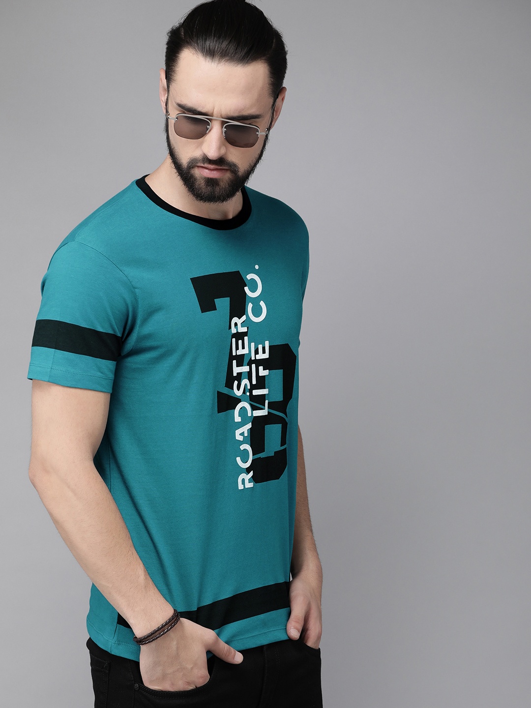 

The Roadster Lifestyle Co Men Teal Blue Printed Round Neck Pure Cotton T-shirt