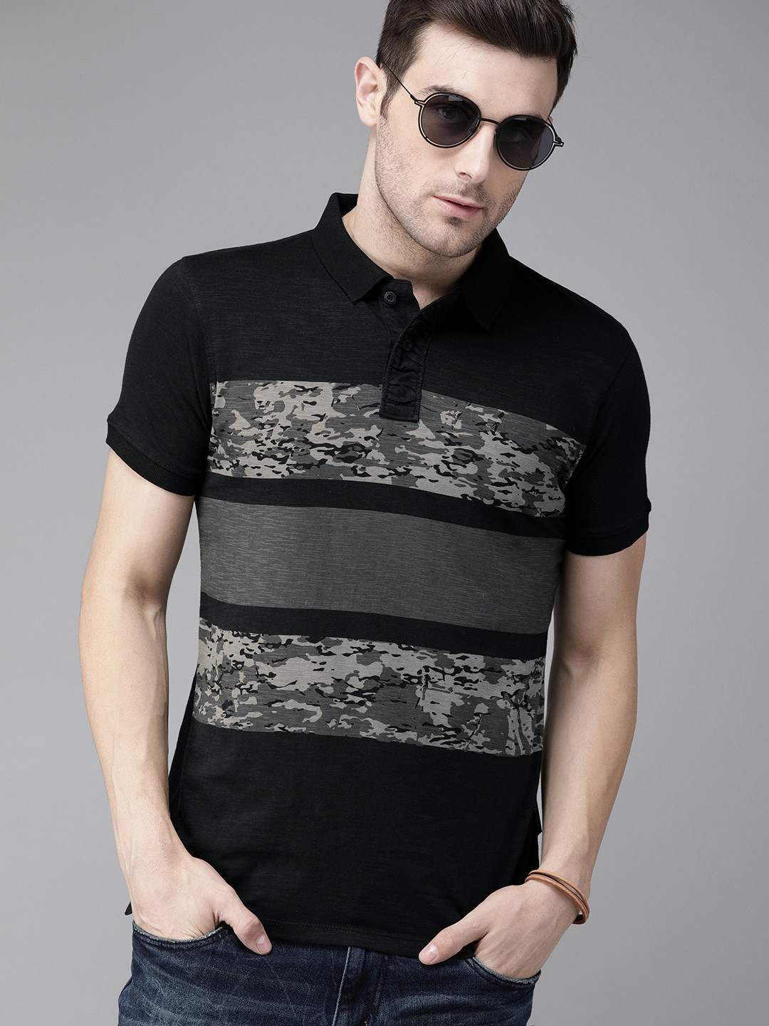 

The Roadster Lifestyle Co Men Black Camouflage Printed Polo Collar Pure Cotton T-shirt