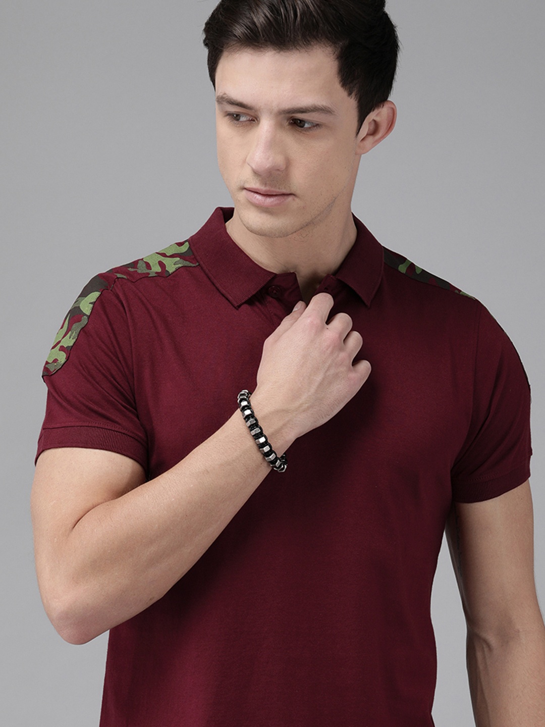 

The Roadster Lifestyle Co Men Maroon Solid Polo Collar Pure Cotton T-shirt