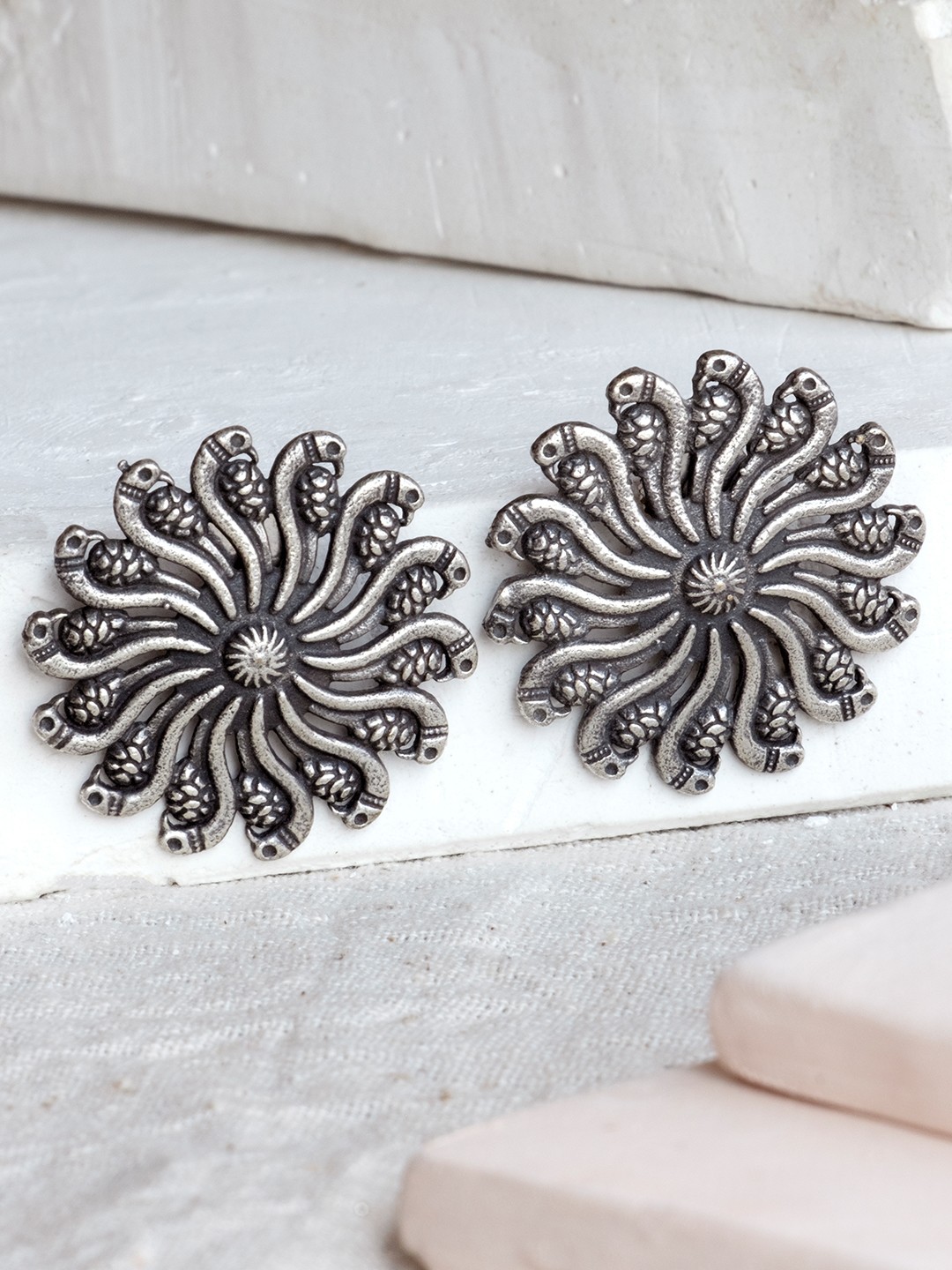 

Infuzze Oxidised Silver-Plated Textured Peacock Shaped Oversized Studs