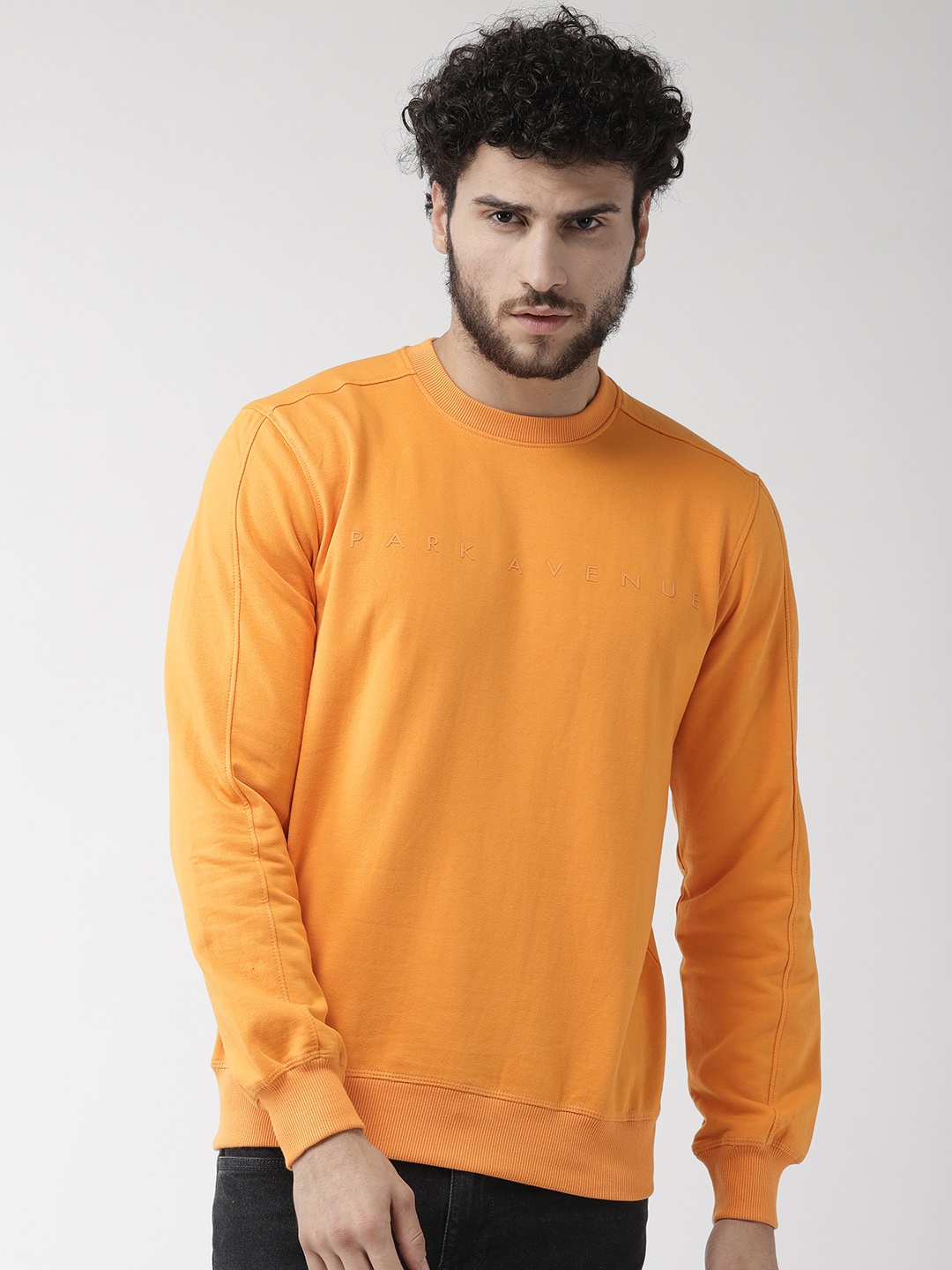 

Park Avenue Men Yellow Solid Sweatshirt