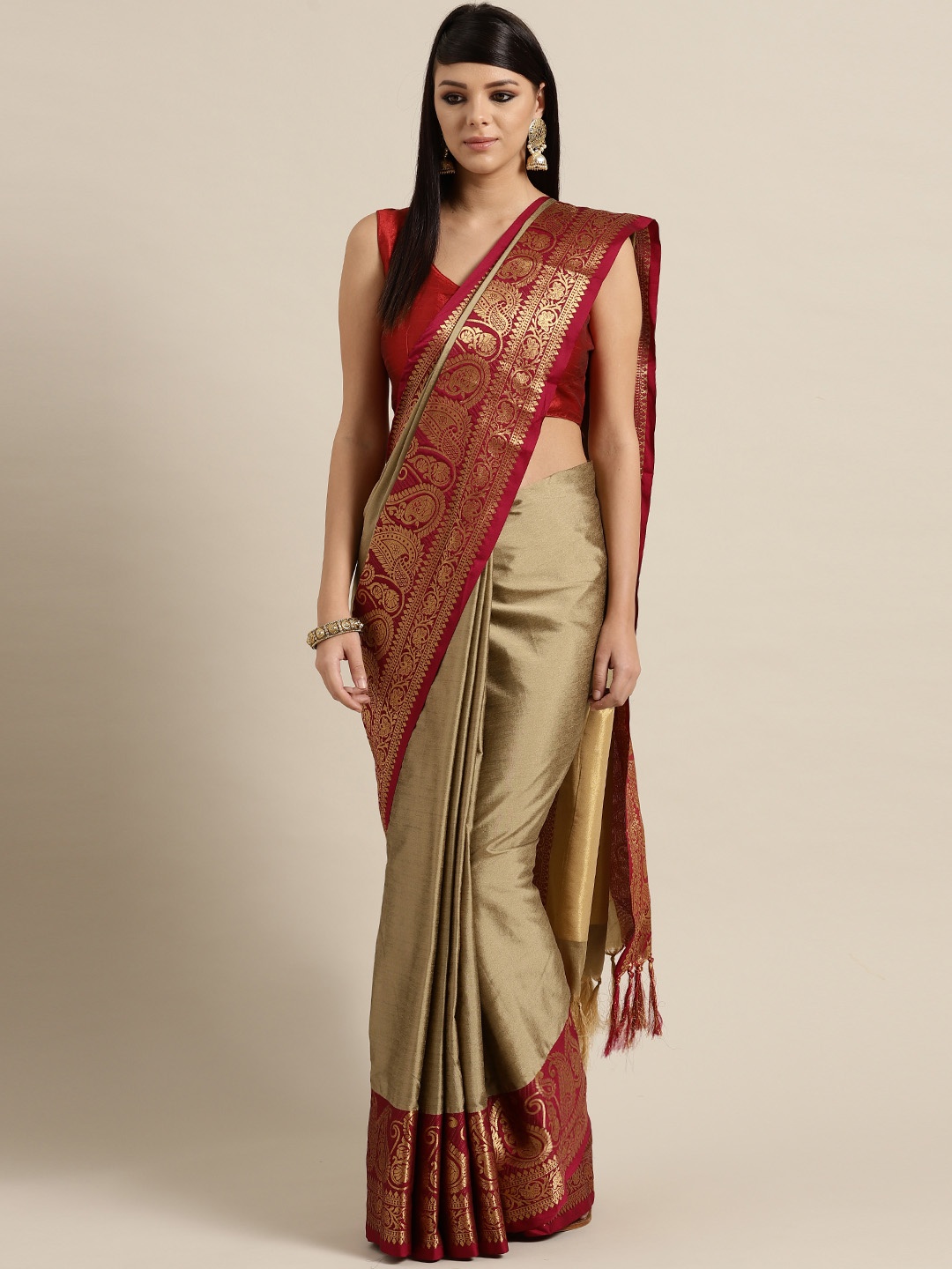 

Rajesh Silk Mills Taupe & Magenta Solid Saree