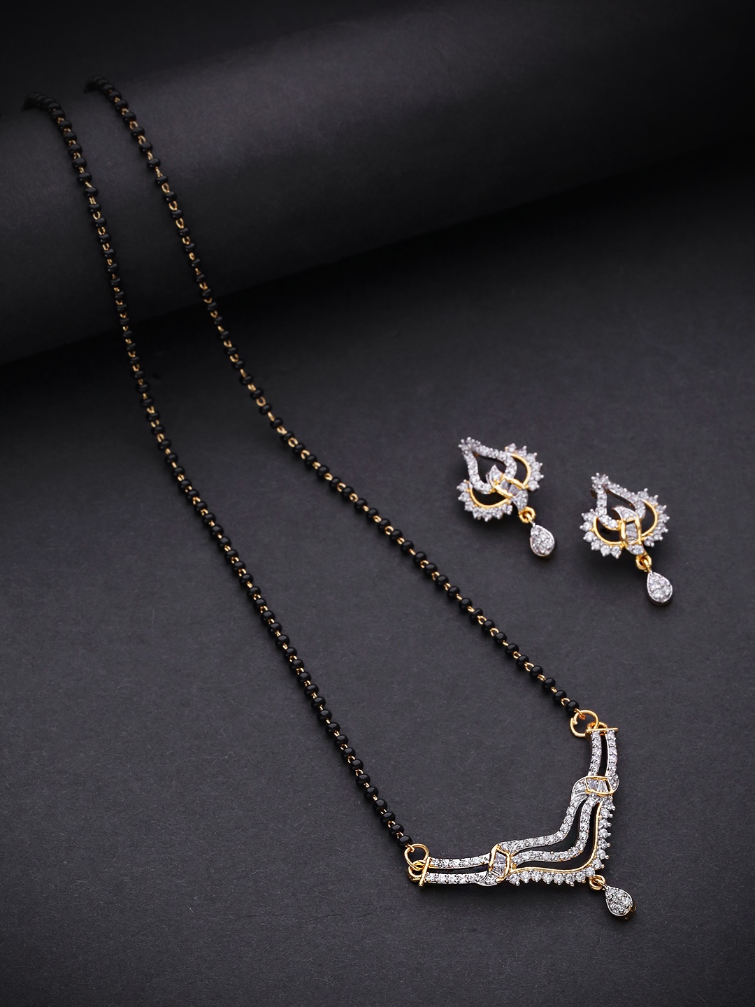 

Priyaasi Black Gold-Plated Beaded & AD Studded Mangalsutra & Earrings Set