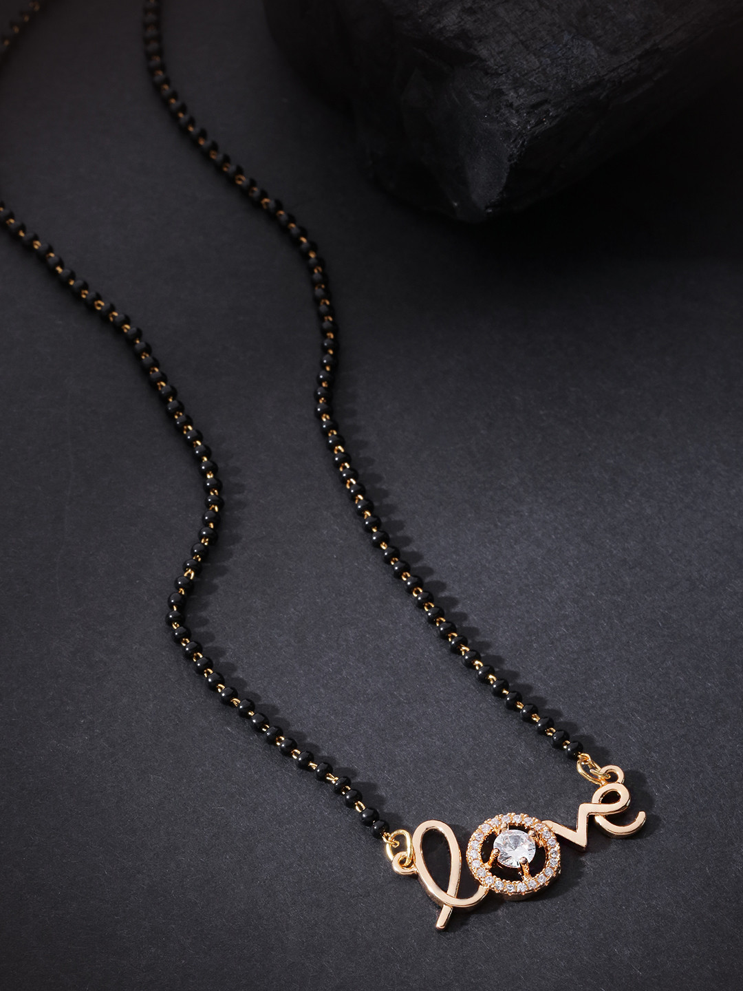 

Priyaasi Black Gold-Plated Beaded & AD Studded Love Textured Mangalsutra