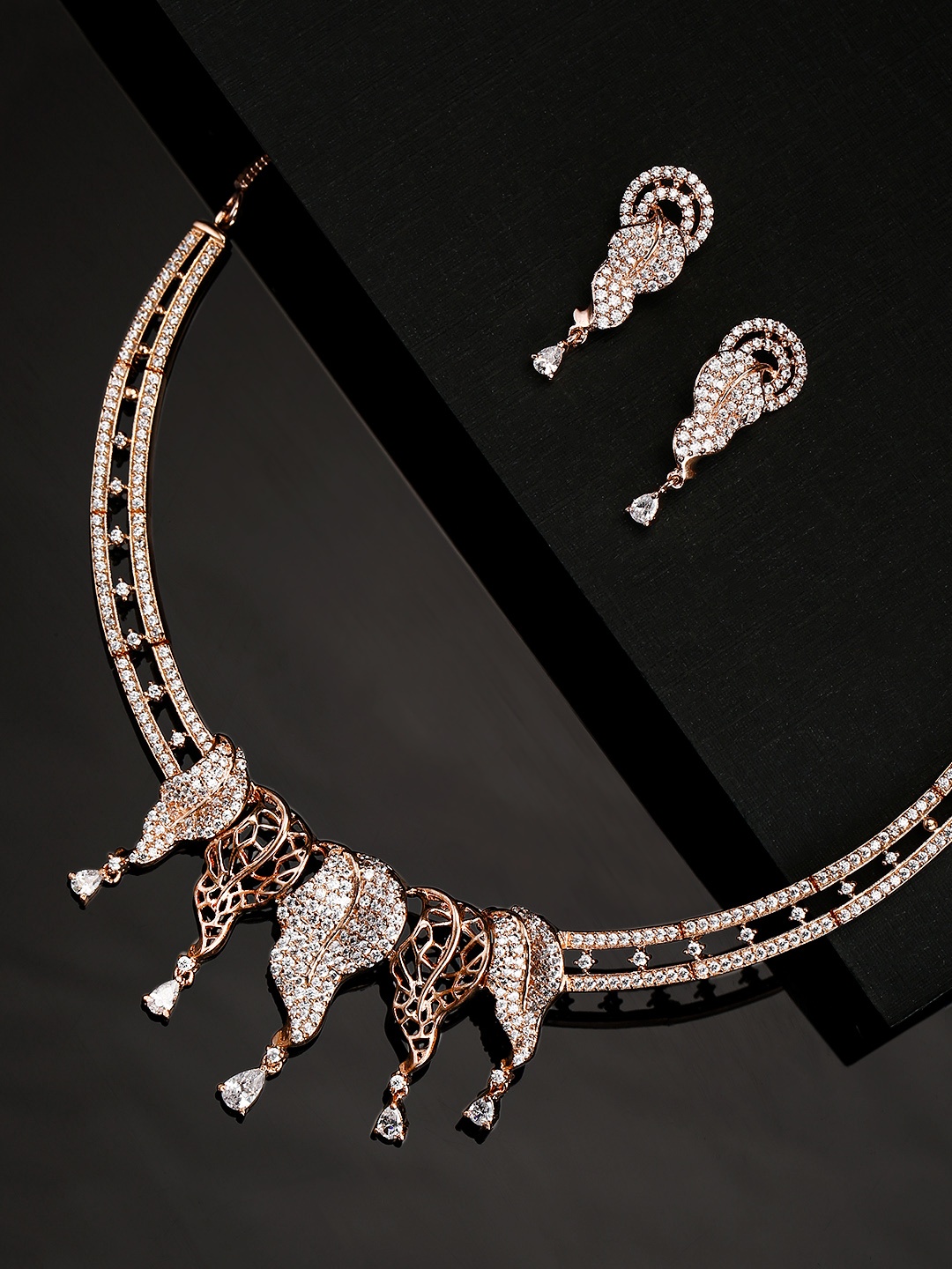 

Priyaasi Rose Gold-Plated AD-Studded Handcrafted Leaf Shaped Jewellery Set