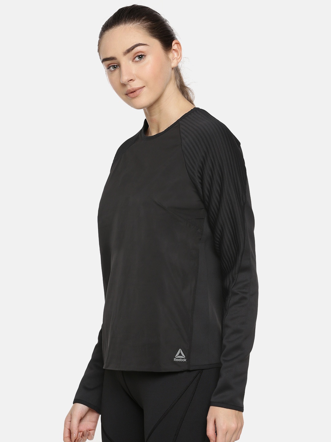 

Reebok Women Black Solid OS THERMOWARM CREW Sweatshirt