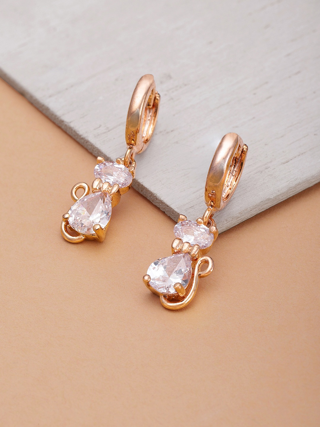 

Priyaasi Rose Gold-Plated American Diamond Studded Cat Shaped Drop Earrings