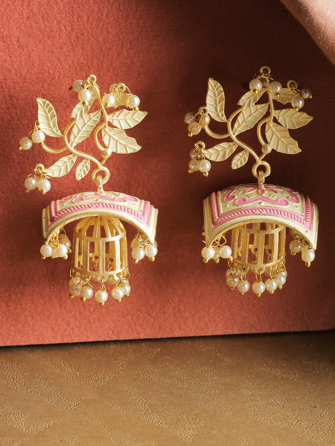 

Priyaasi Pink & Off-White Gold-Plated Beaded Meenakari Leaf Shaped Jhumkas