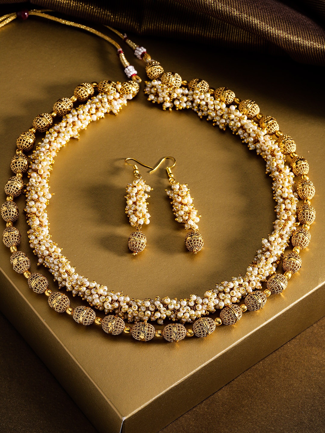 

Priyaasi Off-White Gold-Plated Beaded Handcrafted Jewellery Set