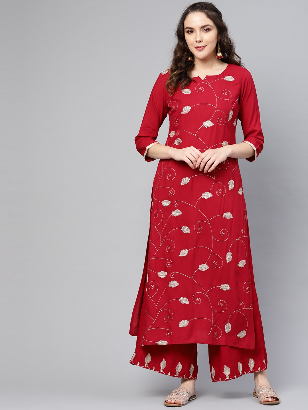 

Varanga Women Red & Golden Embroidered Kurta with Palazzos
