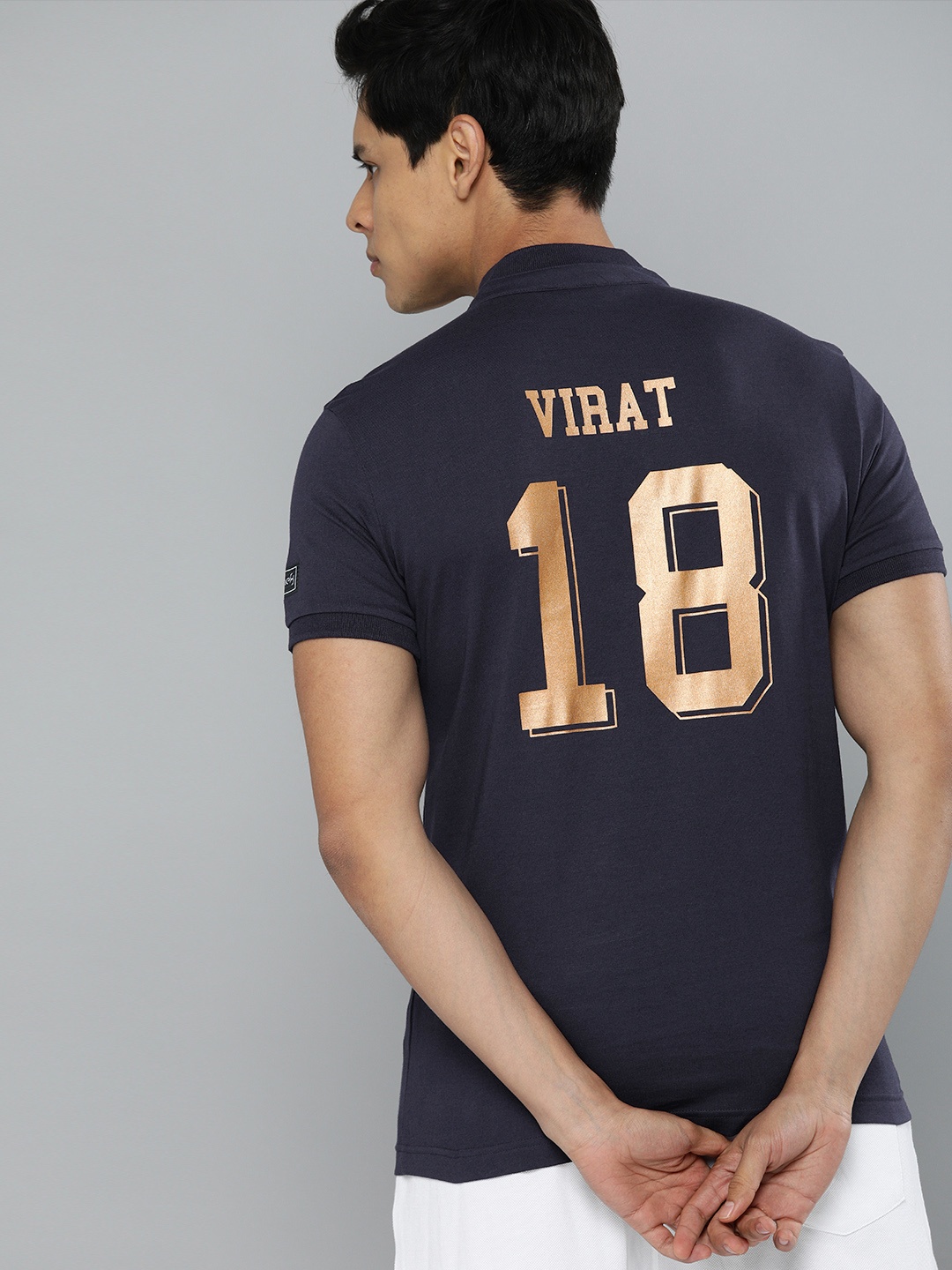 

Puma Unisex Navy Blue Pure Cotton World Cup Victory Polo Printed Henley Neck Pure Cotton T-shirt