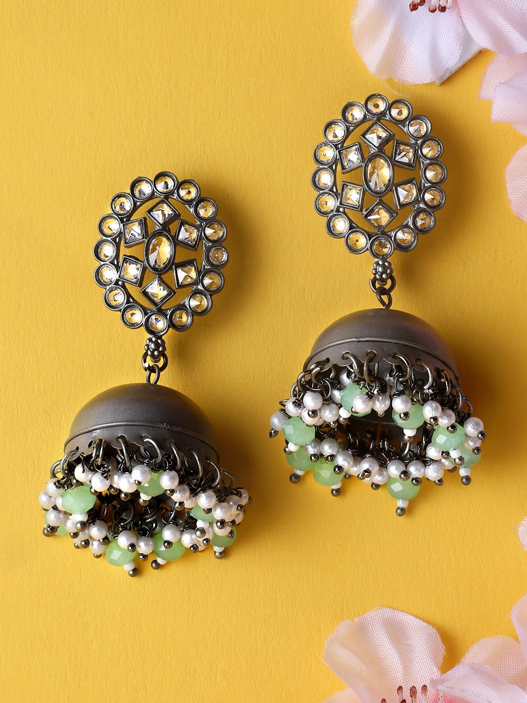 

Rubans Silver-Toned & Green Dome Shaped Handcrafted Kundan Studded Jhumkas