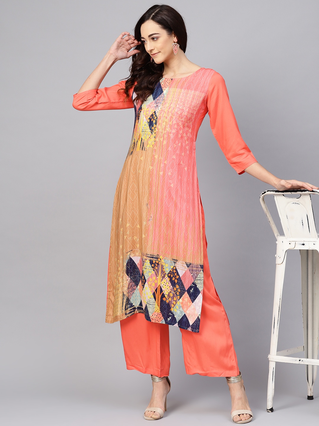 

Meeranshi Women Coral Orange Printed Kurta with Palazzos