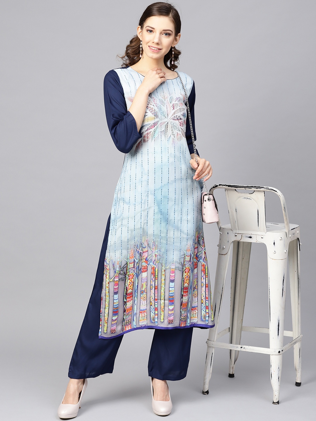 

Meeranshi Women Blue Printed Kurta with Trousers