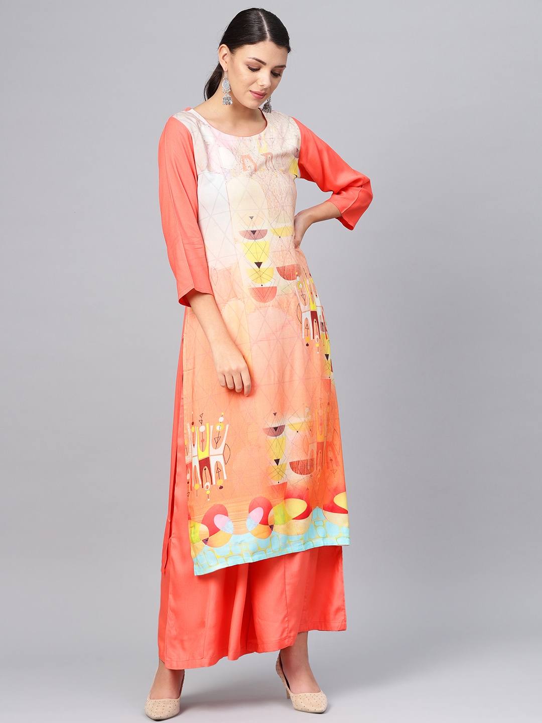 

Meeranshi Women Coral Orange Printed Kurta with Palazzos