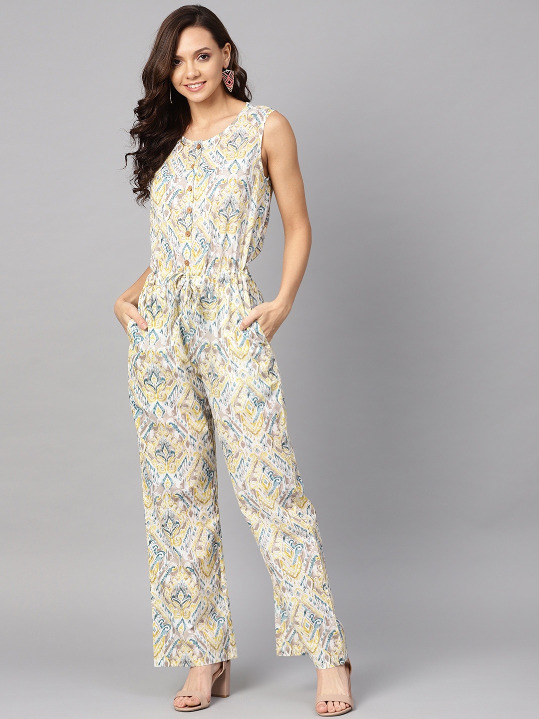 

Yuris Women Off-White & Yellow Printed Basic Jumpsuit