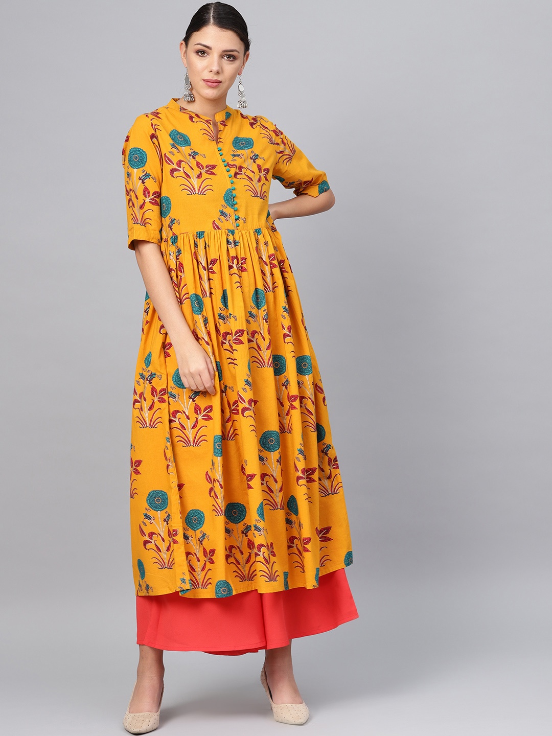 

Meeranshi Women Mustard Yellow & Green Floral Printed A-Line Kurta