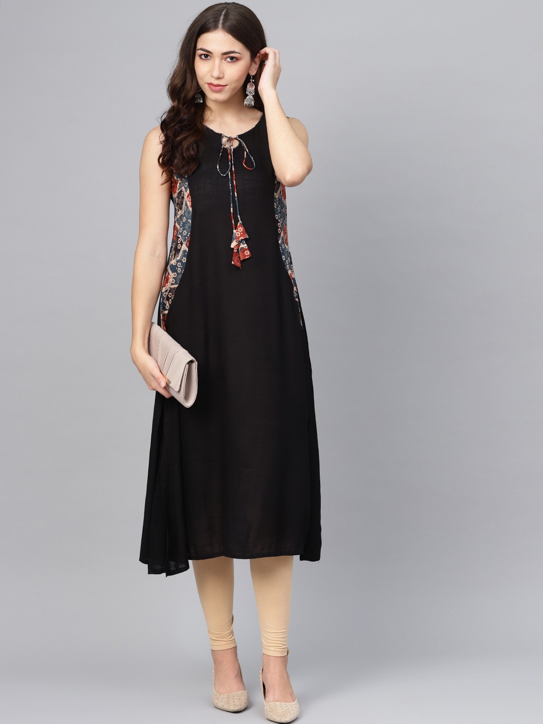 

Meeranshi Women Black Solid A-Line Kurta