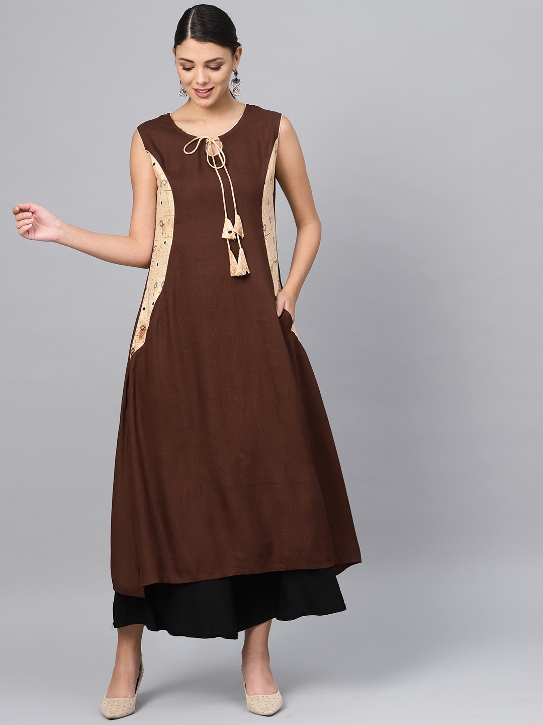 

Meeranshi Women Brown Solid A-Line Kurta