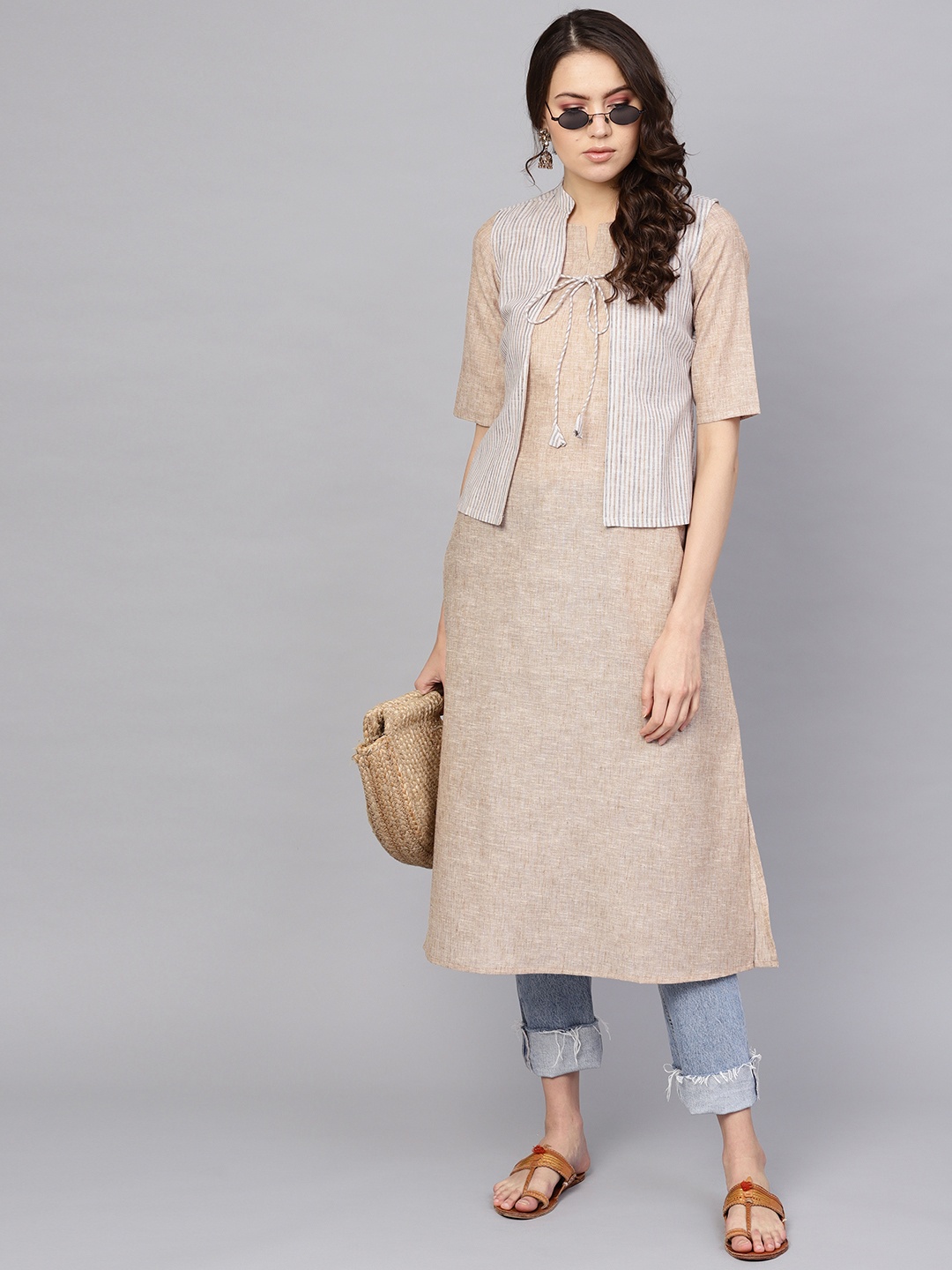 

Libas Women Beige Solid A-Line Kurta with Ethnic Jacket