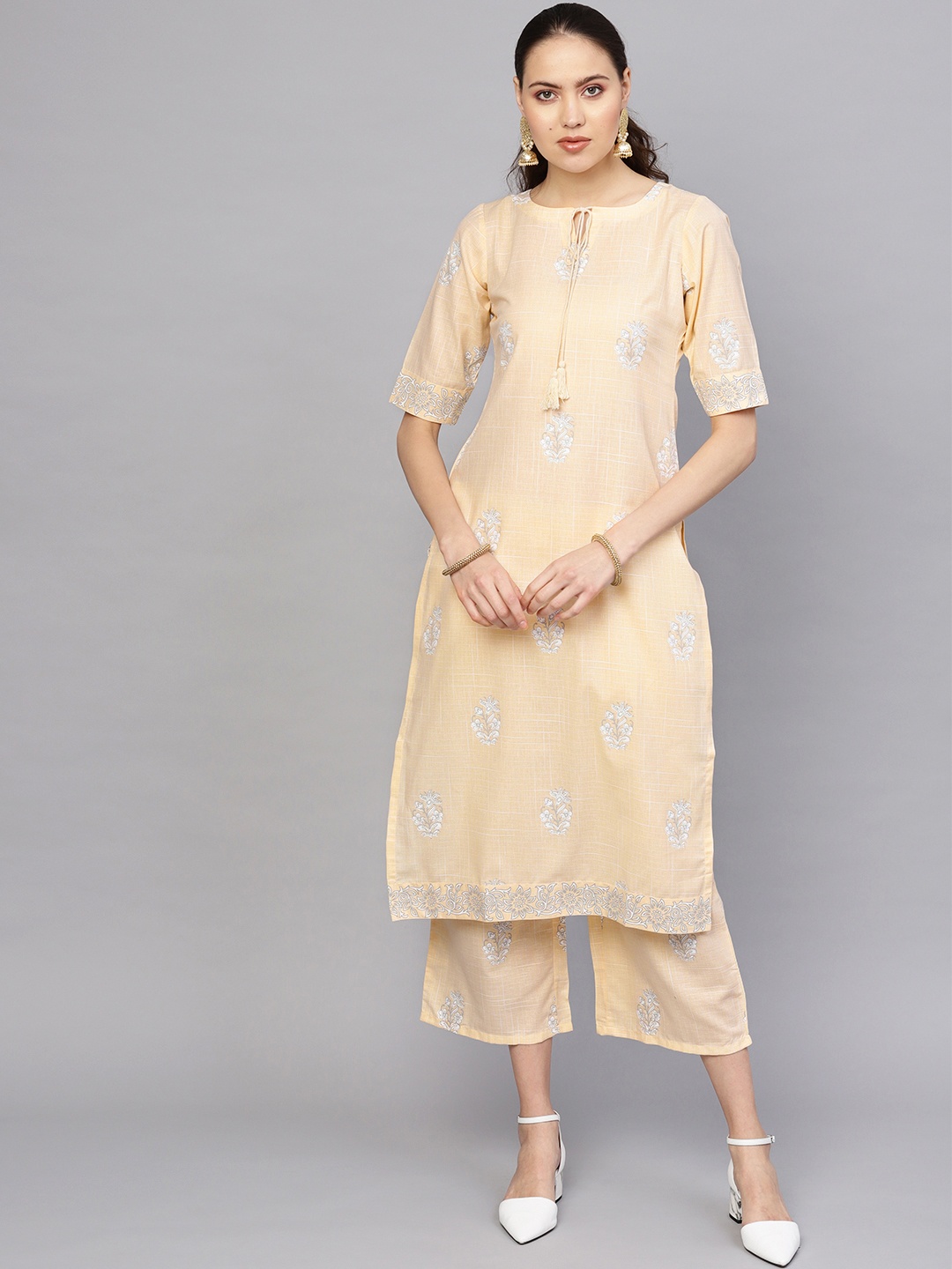 

Libas Women Cream-Coloured & White Block Printed Kurta with Palazzos