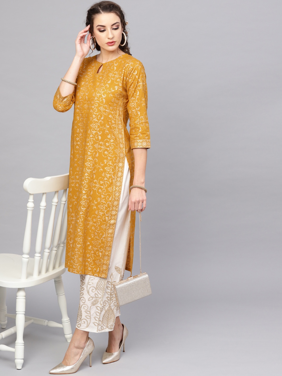 

Libas Women Mustard Yellow & Off-White Printed Kurta with Palazzos