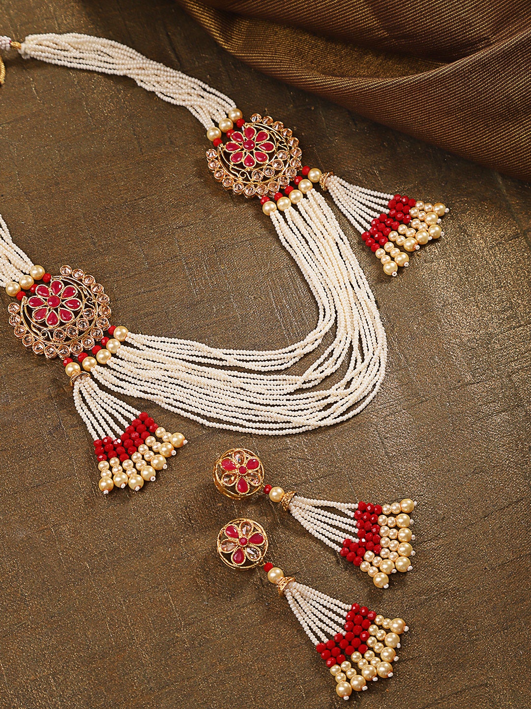 

Priyaasi Off-White & Pink Gold-Plated Stone-Studded & Beaded Jewellery Set